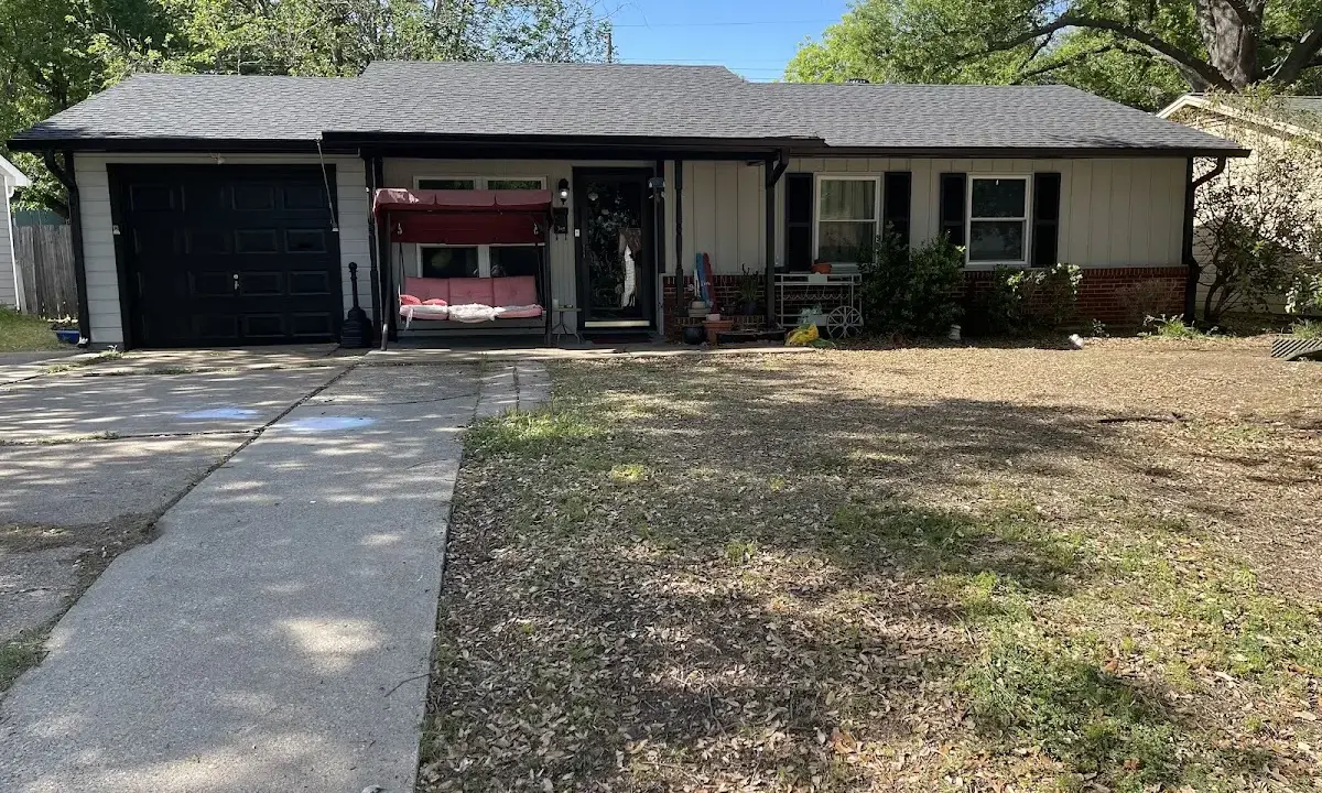Asphalt Shingle Roof Repair crew at work on a residential roof in College Park
